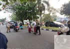 Aksi Humanis di Jalan Raya, Personel Polresta Padang Sigap Gandeng Pelajar dan Warga Menyeberang